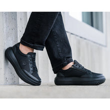 kybun Burgdorf Black, being worn with jeans