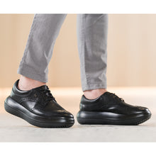 wearing a pair of kybun Chiasso black