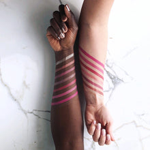 7 cream blush swatches on dark and white arms