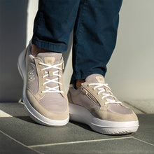 wearing a pair of kybun Burgdorf Beige 