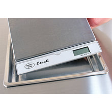 Escali Pronto Surface Mountable Scale being lowered into insert on counter