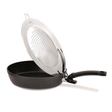 Fissler Clippix Hook-in Spatter Shield tilted up on a frypan