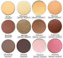 a selection of Pure Anada Pressed Mineral Eye Colors, labeled