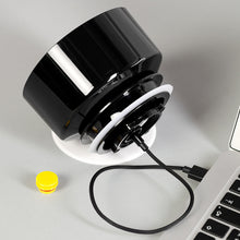 Charging VacOne brewer head with a laptop