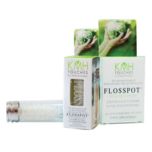 KMH Touches Flosspot on side, next to its package and refills box