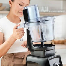 removing container from VitaMix Food Processor Attachment base