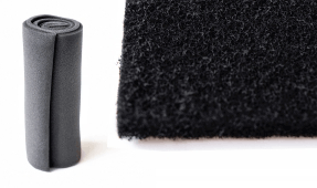 a rolled up Foam Prefilter and part of a Carbon Inner Blanket (size not to scale)