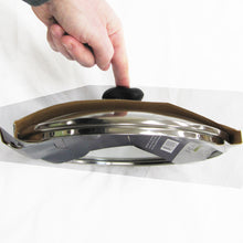 side view of 9.5-inch diameter Scanpan Glass Lid with packaging