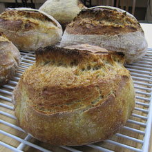 Loaves of sourdough bread with 'ears'