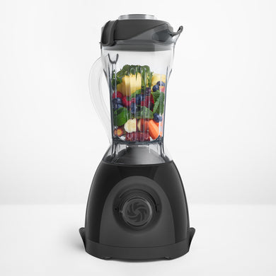 Vitamix One loaded with produce to blend